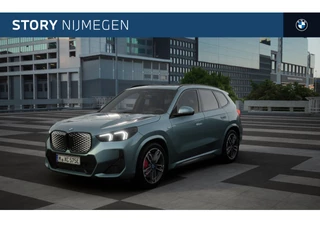 Hoofdafbeelding BMW iX1 BMW iX1 eDrive20 High Executive M Sport / Panoramadak / Trekhaak / Sportstoelen / M Adaptief onderstel / Comfort Access / Adaptieve LED / Stoelverwarming / Parking Assistant Plus / Head-Up / Harman-Kardon