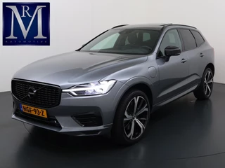 Volvo XC60 2.0 Recharge T8 AWD R-Design PLUG-IN HYBRIDE | SOH 89% | PANORAMADAK | ELEKTR. TREKHAAK | LEDER | CAMERA | HARMAN KARDON | MEMORY SEATS | 21" LMV | WINTERPAKKET STOEL + STUURVERWARMING || RIJKLAAR | 12 MND BOVAG GARANTIE |