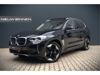 BMW iX3 High Executive 80 kWh | Panoramadak | Keyless | Stoelverwarming | Harman Kardon | Memory Seat | Head-Up Display | 360 Camera | Adaptief Onderstel | Trekhaak | Adaptive LED | Elektrische Stoelen | Apple Carplay |