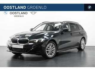 BMW 3 Serie Touring 320e Automaat / Trekhaak / Sportstoelen / Comfort Access / Achteruitrijcamera / Stoelverwarming / Getint glas