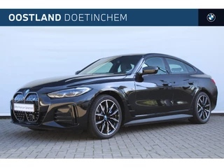Hoofdafbeelding BMW i4 BMW i4 eDrive35 High Executive M Sport / Comfort Access / Live Cockpit Professional / Parking Assistant / Stoelverwarming / Leder
