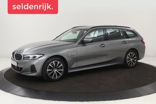 BMW 3-serie 320e Business | Stoelverwarming | Adaptive cruise | Trekhaak | Harman/Kardon | Carplay | Camera | Half leder | Sportstoelen