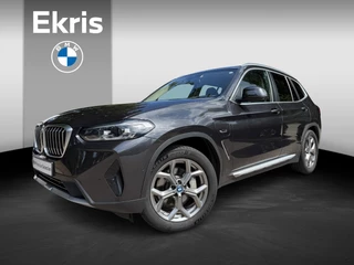 BMW X3 xDrive30e Trekhaak met elektrisch wegklapbare kogel | Parking Assistant Plus | Extra getint glas | 19 inch LM Y-spaak (Styling 693) in Ferric Grau