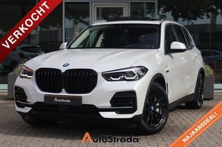 BMW X5 xDrive45e High Executive 394pk | Camera | Trekhaak | LED | Navi | Carplay | Sfeer | Stoelverwarming | Pano