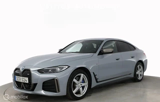 Hoofdafbeelding BMW i4 BMW i4 M50 84 kWh, zomer- en winterbanden