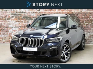 BMW X5 xDrive45e High Executive M Sport Pakket Automaat / Live Cockpit Professional / Panoramadak / Trekhaak / CoPilot Pack / Comfortstoelen / Head-Up Display / Luchtvering / Driving Assistant Professional / Hifi / Stoelverwarming voor+achter / Merino Leder / 21 Inch / M Sportremsysteem / Achteruitrijcamera / Stuurwielverwarming