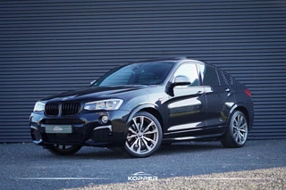 Hoofdafbeelding BMW X4 BMW X4 M40i High Executive / Schuifdak / Carplay / Trekhaak / ACC