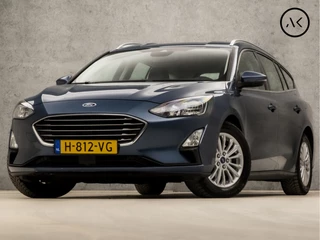 Ford Focus Wagon 1.0 EcoBoost Titanium Business Automaat (APPLE CARPLAY, GROOT NAVI, STUUR/STOELVERWARMING, ADAPTIVE CRUISE, SPORTSTOELEN, CAMERA, KEYLESS, TREKHAAK, NIEUWSTAAT)