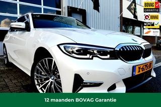 Hoofdafbeelding BMW 3 Serie BMW 3-serie Touring 330i xDrive High Executive NAV/LEER/PANO