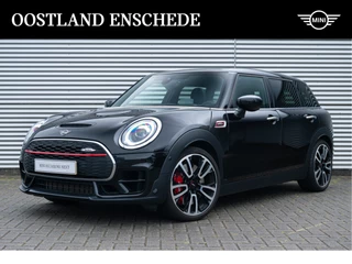 Hoofdafbeelding MINI Clubman MINI Clubman JCW ALL4 Chili Automaat / Panoramadak / Achteruitrijcamera / Comfort Access / Stoelverwarming / Head-Up /  LED / Harman Kardon / Sportonderstel / PDC / Active Cruise Control / Airconditioning