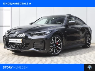 BMW i4 eDrive35 High Executive M Sport / Schuif-kanteldak / Stoelverwarming / Active Cruise Control / Parking Assistant / Live Cockpit Professional / Verwarmd stuurwiel