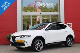 Alfa Romeo Tonale PHEV 280PK VELOCE | PANORAMISCH SCHUIF/KANTEL DAK | PREMIUM PACK: LEDEREN BEKLEDING/GEVENTILEERDE VOORSTOELEN/4-VOUDIG ELEKTRISCH VERSTELBARE LENDESTEUN VOORSTOELEN/HOOGGLANS ZWARTE RAAMOMLIJSTING/AMBIENT LIGHTING | TECHNOLOGY PACK: PARKEERWAARSCHUWING VOOR EN ACHTER/360° CAMERA/AUTOMATISCH INPARKEREN/ AUTONOMOUS DRIVING LEVEL 2: ADAPTIVE CRUISE CONTROL/LANE CENTERING ASSIST/TRAFFIC JAM ASSIST DODEHOEK DETECTIE AUTOMATISCH DIMMENDE BUITENSPIEGELS ELEKTRISCH BEDIENBARE ACHTERKLEP | WINTERPACK: STOELVERWARMING VOOR/STUURVERWARMING/VERWARMBARE RUITENSPROEIERS | HARMAN KARDON SOUND SYSTEM | 20" LICHTMETALEN VELGEN "GRAPHITE GREY" | DRAADLOZE TELEFOONLADER | NAVIGATIE | DRAADLOZE APPLE CARPLAY/ANDROID AUTO | FULL LED MATRIX KOPLAMPEN |