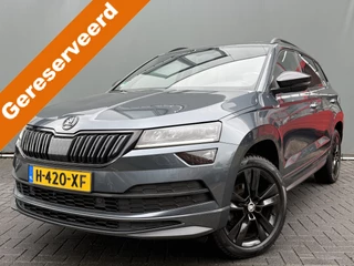 Škoda Karoq BWJ 2020 1.5 TSI 150 PK ACT Sportline Business AUTOMAAT | TREKHAAK | KEYLESS | CAMERA | PANORAMADAK | APPLE CARPLAY | ANDROID AUTO | NAVI | CLIMA | CRUISE | LMV | PDC