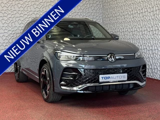 Volkswagen Tiguan 1.5 eTSI R-LINE 3D LED GRILL 19''LMV ERGO.STOEL MASSAGE ELEK.KLEP DESIGN PACK STOEL/STUUR VERW TREKHAAK NIEUWE AUTO! 09/2024 70 BIJNA NIEUWE VOLKSWAGEN'S UIT VOORRAAD LEVERBAAR