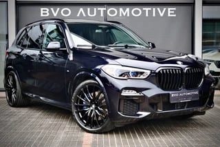 BMW X5 xDrive45e 4-wielsturing B&W Massage Pano Trekhaak HeadUp Carbon