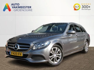 Hoofdafbeelding Mercedes-Benz C-Klasse Mercedes-Benz C-Klasse C180 156pk Aut. PRESTIGE / Camera / Leder-stof / Trekhaak / Veel
