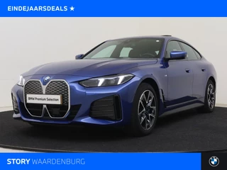 BMW i4 eDrive40 Gran Coupé M Sport / Trekhaak / Achteruitrijcamera / Parking Assistant / Stoelverwarming / Live Cockpit Plus / Widescreen Display