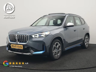 BMW iX1 xDrive30 Launch Edition 313pk Dealer O.H | Panodak | Adaptive Cruise | 360 Camera | Lederen Comfortzetels Massage & Memory | Head Up | Harman Kardon | Keyless |