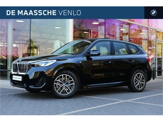 Hoofdafbeelding BMW iX1 BMW iX1 xDrive30 M Sport / Panoramadak / Sportstoelen / Achteruitrijcamera / M Adaptief onderstel / Leder / 18" LMV