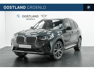Hoofdafbeelding BMW X3 BMW X3 xDrive30e Automaat / Trekhaak / Panoramadak / 	Sportstoelen / Comfort Access / Achteruitrijcamera / Head-Up / Laserlight
