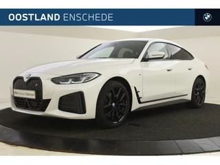 Hoofdafbeelding BMW i4 BMW i4 eDrive35 M Sport / Parking Assistant / Widescreen Display / Extra getint glas achter / Live Cockpit Plus / Cruise Control