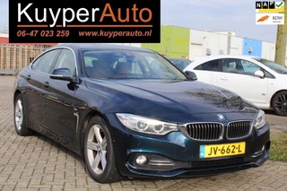 Hoofdafbeelding BMW 4 Serie BMW 4-serie Gran Coupé 418i Centennial High Executive nap VOL LEDER CAMERA``S NAVI NL AUTO