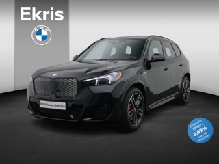 BMW iX1 eDrive20 M Sportpakket Pro | Premium Pack | Comfort Pack | Travel Pack | Stuurwiel Verwarmd | Panoramadak | Elektrisch Verstelbare Stoelen | Driving Assistant Plus | DAB | Harman Kardon | 19''