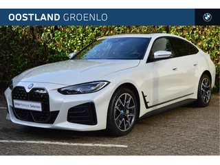Hoofdafbeelding BMW i4 BMW i4 eDrive35 M Sport / Schuif-kanteldak / Active Cruise Control / Parking Assistant / Widescreen Display / Stoelverwarming / Live Cockpit Plus