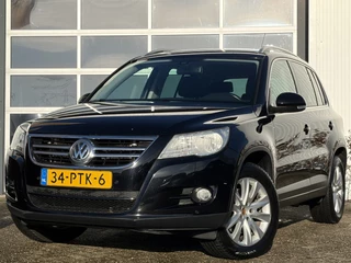 Volkswagen Tiguan 1.4 TSI Sport&Style 122pk | Achteruitrijcamera | Bluetooth | Cruise control | Electronic climate control | Lichtmetalen velgen 17" | Navigatiesysteem | Parkeersensor voor en achter | Perfect onderhouden!