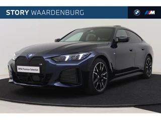 Hoofdafbeelding BMW i4 BMW i4 M50 High Executive / Schuif-kanteldak / Trekhaak / M Adaptief onderstel / Adaptieve LED / Parking Assistant Plus / Stuurverwarming / Facelift-LCI