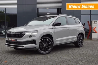 Hoofdafbeelding Škoda Karoq Škoda Karoq 1.5 TSI DSG Sportline 150pk/ Panodak/ Navi/ Camera/ ACC/ App-Connect/ stoelverwarming v&a
