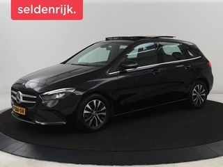 Hoofdafbeelding Mercedes-Benz B-Klasse Mercedes-Benz B-klasse 180 Business Solution | Panoramadak |  Stoelverwarming | Carplay | Camera | Half leder | Navigatie | Park Assist | Keyless | Widescreen | Full LED