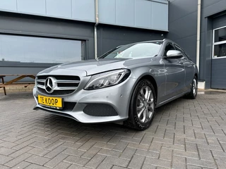 Hoofdafbeelding Mercedes-Benz C-Klasse Mercedes-Benz C-Klasse C180 Estate Ambition Aut. Navi Camera stoelverw.