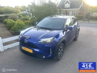 Hoofdafbeelding Toyota Yaris Cross Toyota Yaris Cross 1.5 Hybrid Explore ACHTERUITRIJ CAMERA CARPLAY NAVIGATIE STUUR/STOELVERWARMING KEURIGE AUTO!!