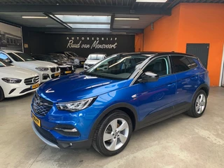 Hoofdafbeelding Opel Grandland X Opel Grandland X 1.2 TURBO EDITIE. 2020 / Zwart dak / Sportstoelen / Navi / Camer