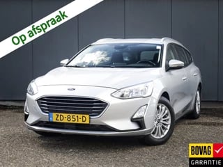 Ford Focus Wagon 1.0 EcoBoost Titanium Business (126 PK) 1e-Eig, Ford-Dealer-Onderh, 12-Mnd-BOVAG, NL-Auto, Trekhaak, Navigatie/Apple-Carplay/Android-Auto, Cruisecontrol, Keyless-Entry/Start, Parkeersensoren-V+A, Licht-Zicht-Pakket, Sportstoelen, Airco, Lm-Velgen-16Inch, Privacy-Glas