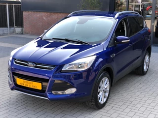 Hoofdafbeelding Ford Kuga Ford Kuga 1.5 Titanium NIEUWSTAAT NAVI CRUISE CLIMA PDC LEER L.M. SPORTVELGEN