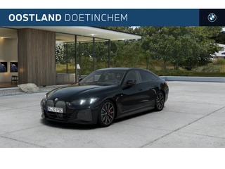 BMW i4 eDrive35 High Executive M Sport / Schuif-kanteldak / Trekhaak / Active Cruise Control / Parking Assistant Plus / Stoelverwarming / Comfort Access / M Adaptief onderstel