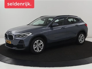 BMW X2 xDrive25e High Executive | SOH 85,7% | Head-Up | Leder | Sportstoelen | Stoelverwarming | Park Assist | Navigatie | Full LED | Climate control | Bluetooth | Cruise control | Individual Storm Bay Metallic