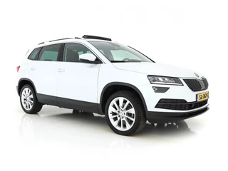 Hoofdafbeelding Škoda Karoq Škoda Karoq 1.6 TDI Style Business Travel-Pack Pro *PANO | FULL-LED | NAPPA-FULL-LEATHER | NAVI-FULLMAP | CANTON-PREMIUM-AUDIO | ADAPT.CRUISE | KEYLESS | CAMERA | DAB | AMBIENT-LIGHT |  TOWBAR | SPORT-SEATS | 18"ALU*