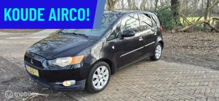 Zwarte Mitsubishi Colt 1.3 Intro Edition Dealer onderhouden