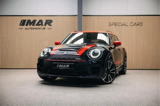 Hoofdafbeelding MINI Clubman MINI Clubman 2.0 JCW ALL4 John Cooper Works | JCW | Rood dak | Sportstoelen | Stoelverwarming | Head-Up |