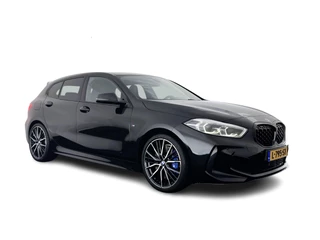 Hoofdafbeelding BMW 1 Serie BMW 1 Serie M135i xDrive High Executive Aut. *HEAD-UP | FULL-LED | HEATED-SPORTSEATS | SHIFT-PADDLES | DIGI-COCKPIT | NAVI-FULLMAP | DAB+ | PRIVACY-GLASS | AMBIENT-LIGHT | 19''ALU*