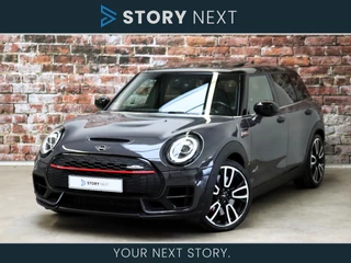MINI Clubman JCW ALL4 Serious Business Automaat 306pk / Navigatiesysteem Plus / Panoramadak / MINI Yours Leer / Head-Up Display / Driving Assistant / LED / Stoelverwarming / Achteruitrijcamera / Harman Kardon / 19 Inch / Elektrisch Verstelbare Comfortstoelen