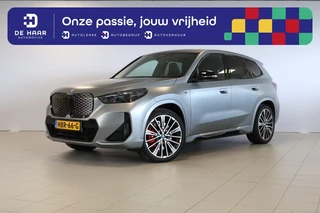 Hoofdafbeelding BMW iX1 BMW iX1 eDrive20 M Sport Pro - Frozen Pure Grey - Pano - 20'' LMV