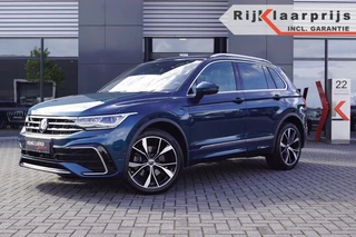 Hoofdafbeelding Volkswagen Tiguan Volkswagen Tiguan 1.4 e-Hybrid R-Line 245pk/ Panodak /leer/Trekhaak /DCC / ACC /Navi Pro /360gr. Camera / AppConnect