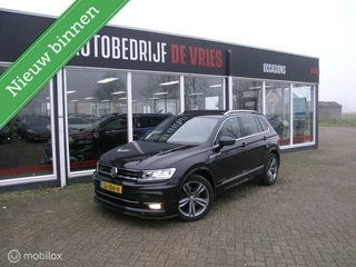 Volkswagen Tiguan 1.4 TSI R-line Nieuwe motor slechts 20dkm! Zeer complete uitvoering.