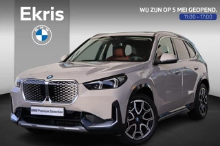 BMW iX1 eDrive20 67 kWh X-line | Glazen Panoramadak | Trekhaak Elektrisch | Stuur- en stoelverwarming | Stoelen Elektrisch met Massage | Active Cruise Control | Head-Up Display | Harman Kardon