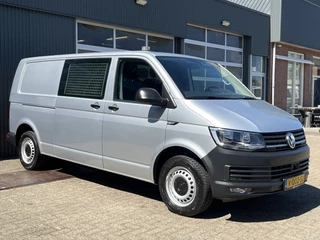 Volkswagen Transporter 2.0 TSI L2H1 Benzine Dubbele schuifdeur Airco Cruise controle Telefoonverbinding Navigatiesysteem Achteruitrij camera Parkeersensoren Achter Euro 6 1e eigenaar Lage belastingtarief prive BPM vrij