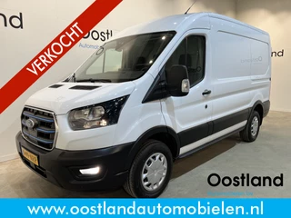 Ford E-Transit 390 (3500 kg) L2H2 Trend 68 kWh 184 PK / 100% Elektrisch !! / Airco / Cruise Control / CarPlay / Camera / Navigatie / 3-Zits / 12.200 KM !!